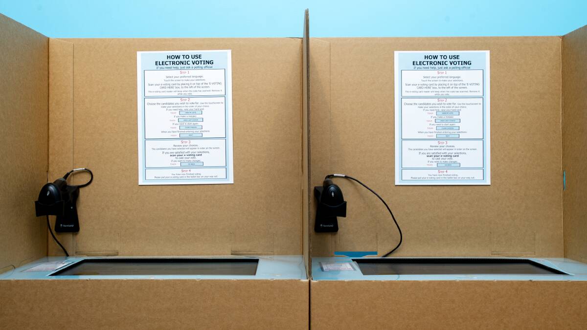Electronic voting booths in use at the 2020 ACT election. Picture: Elesa Kurtz