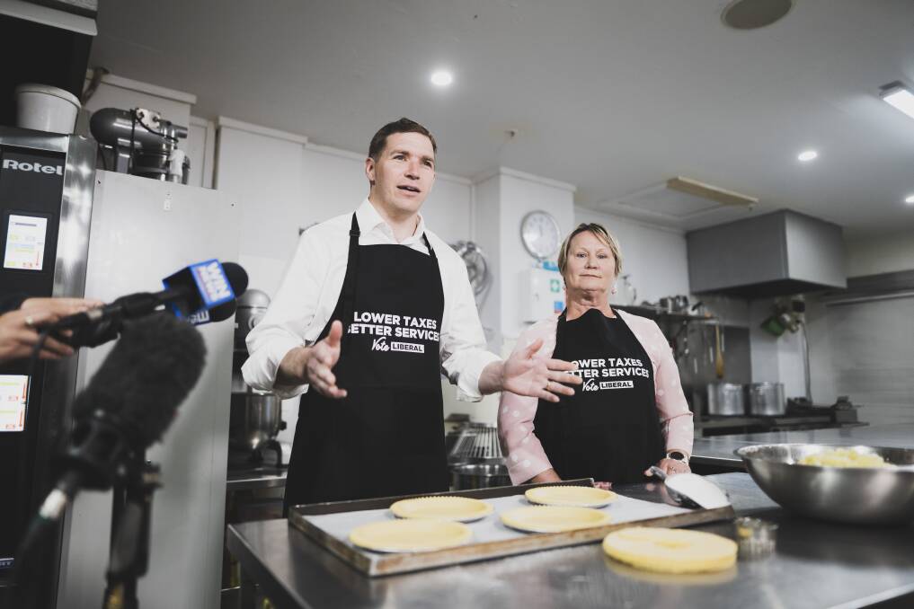 Canberra Liberals leader Alistair Coe and deputy leader Nicole Lawder baked apple pies to illustrate their economic plan Picture: Dion Georgopoulos