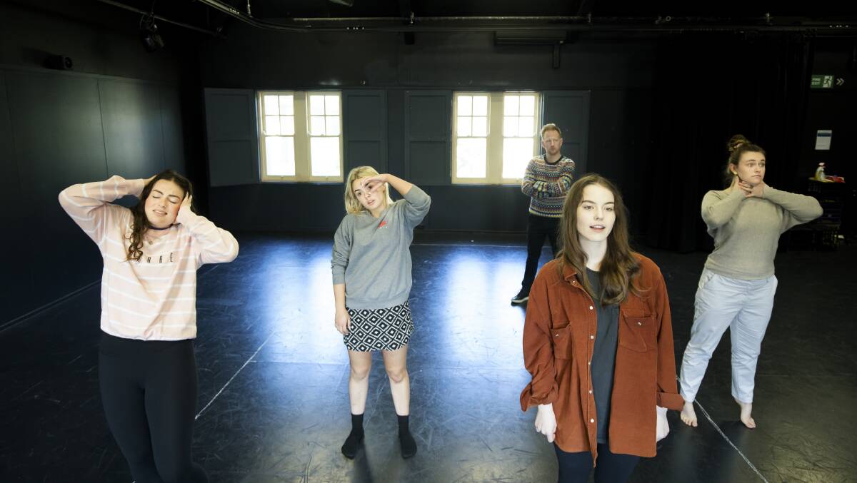 Luke Rogers, rear, directing a rehearsal of Normal, which features, from left, Jemma Collins, Elektra Spencer, Holly Ross, and McKenzie Battye-Smith. Picture: Sitthixay Ditthavong