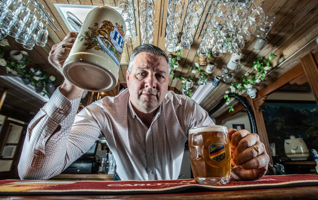 General manager of the Harmonie German Club Paul Berger says the stein glass of beer is the traditional way of celebrating Oktoberfest. Picture: Karleen Minney