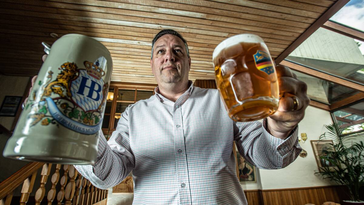On one hand it's a stein, on the other not. General manager of the Harmonie German Club, Paul Berger, is in a battle with the ACT government to allow the sale of beer in steins at its upcoming Oktoberfest. Picture: Karleen Minney