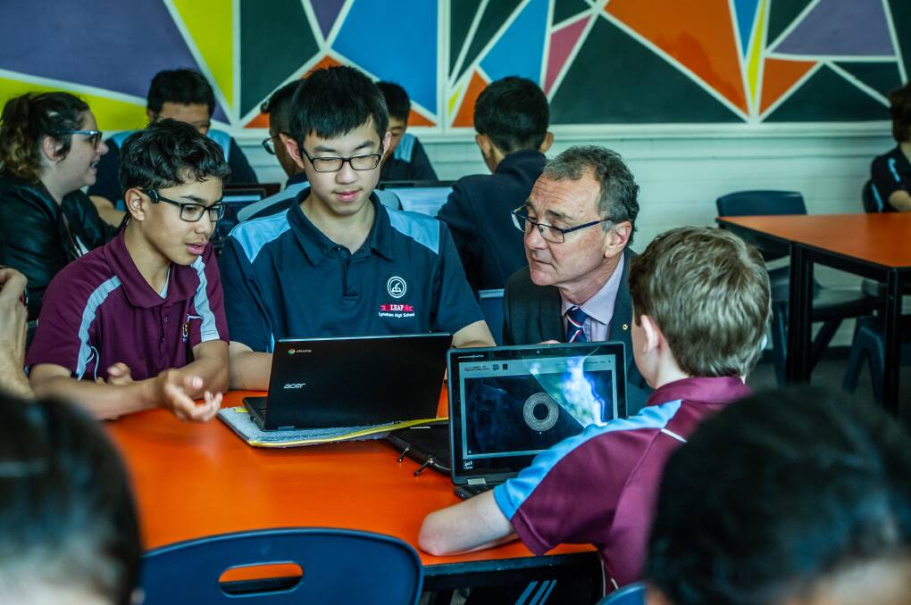 The National Museum of Australia's director Dr Mathew Trinca launches Australia's Defining Moments Digital Classroom at Lyneham High School's year 8 class. Picture: Karleen Minney