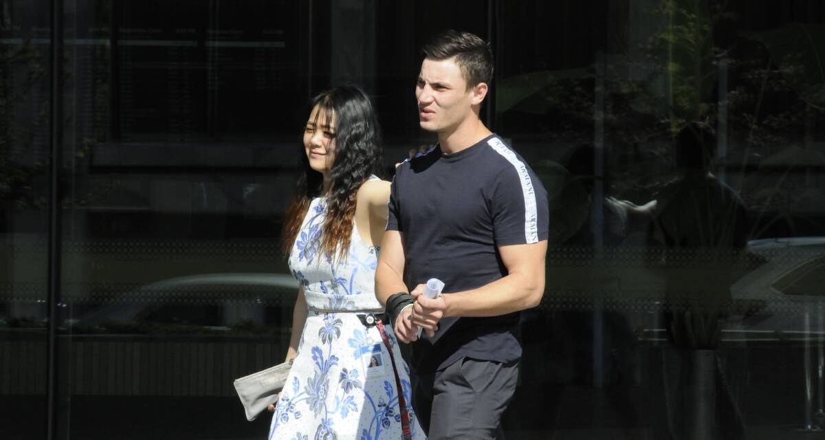 Jacob Sommers, right, leaves the ACT Magistrates Court on Thursday afternoon. Picture: Blake Foden