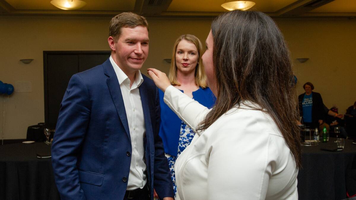 Opposition leader Alistair Coe is consoled by Guilia Jones after his concession speech on Saturday night. Picture: Elesa Kurtz