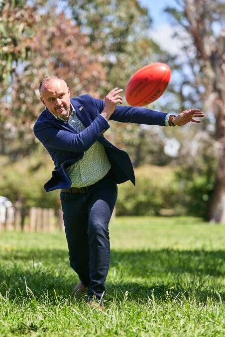 Chief Minister Andrew Barr kicked and passed the Sherrin as Labor basked in another ACT election victory Picture: Matt Loxton
