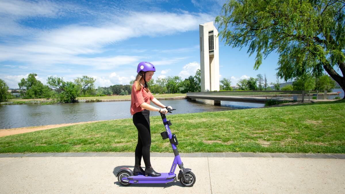 A Canberra Times journalist, Kathryn Lewis, tries out an e-scooter.
Picture: Elesa Kurtz