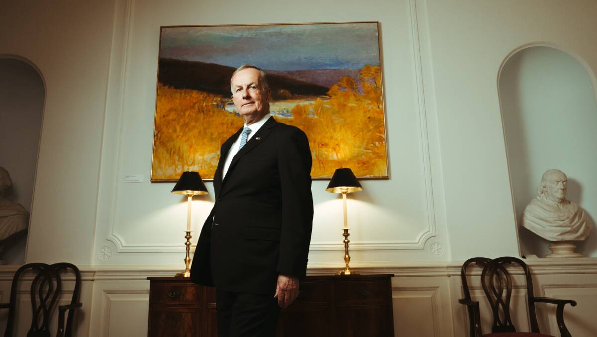 US Ambassador Arthur Culvahouse jnr stands in front of his favourite painting 'The Lamoille River at Ten Bends', 1990, by Wolf Kahn in the US Embassy in Canberra. Picture: Dion Georgopoulos 
