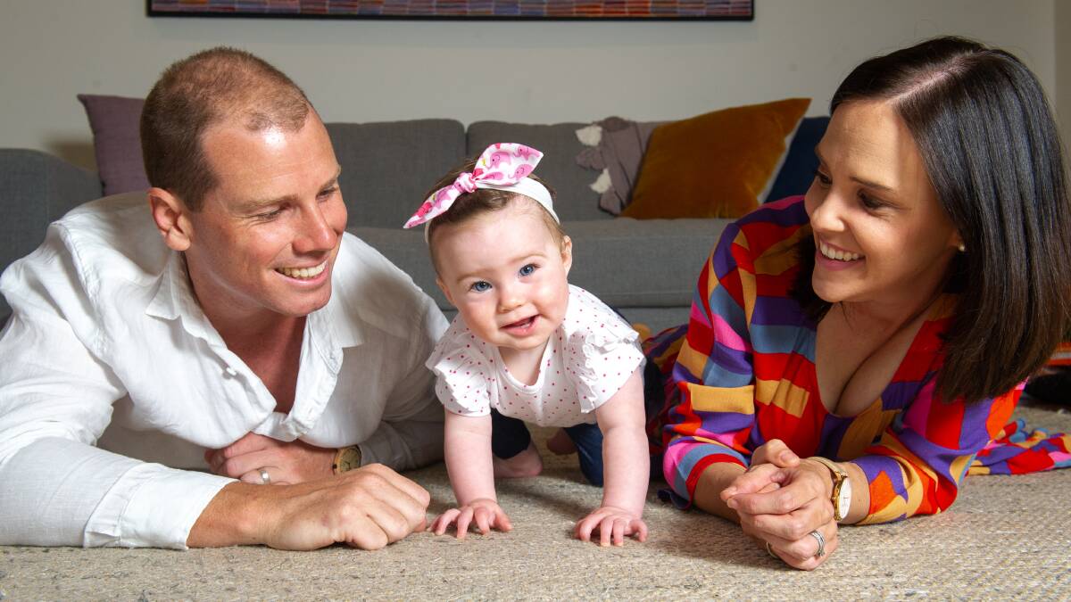 Jess and Joel Richardson with their daughter, Charlotte - born through IVF. Picture: Elesa Kurtz