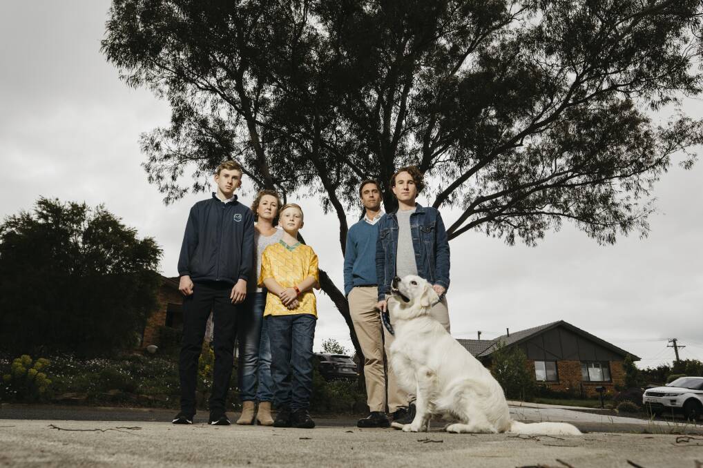 Liam, Hayley, and Oliver Hickey, with Stuart Whitaker and Todd Lynch in front of the tree. Picture: Dion Georgopoulos