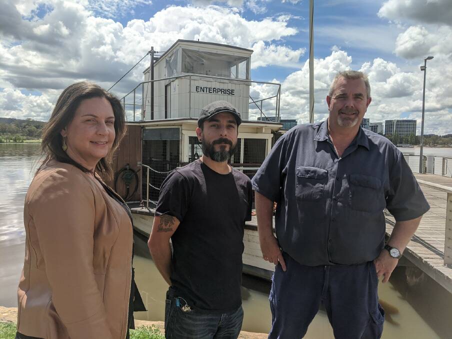 The National Museum's head of Collection Care and Management Linda Byrne with senior large technology conservator Nathan Pharaoh and large technology conservator Craig Webb this week with the 1878 Paddle Steamer Enterprise. Picture: Megan Doherty