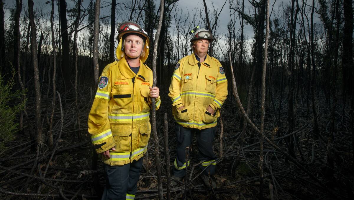 Bawley Point Rural Fire Brigade volunteers Lise Percival and Hendrik Boone in bush land that was burnt on December 5, 2019 at Bawley Point. Picture: Sitthixay Ditthavong