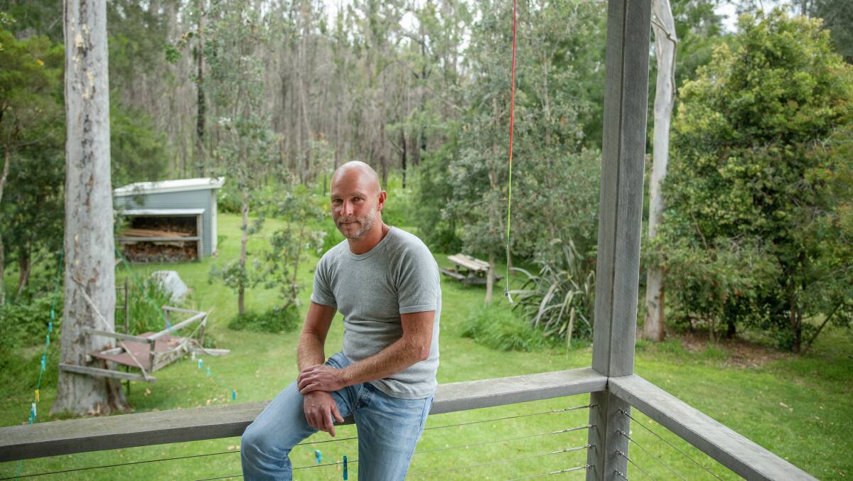 Alan Swanson at his Bawley Point home, which came under threat from bushfire. Picture: Sitthixay Ditthavong