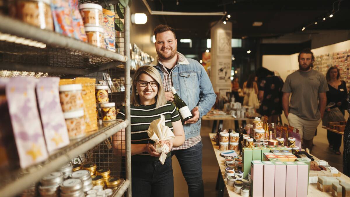 Pop Canberra owners and founders Mikhaila Davis and Gabriel Trew welcome new government vouchers to support local businesses. Picture: Dion Georgopoulos