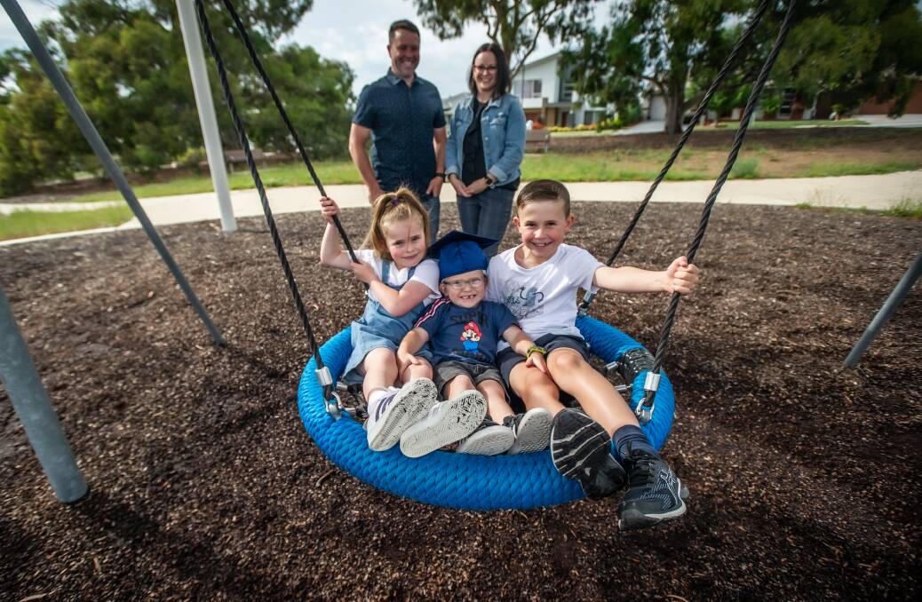 Harry Rupil, 5, was born with profound hearing loss. He's pictured with his mother Cailin, father Marc, sister Jenna, 6, and brother Lucas, 8. Picture: Karleen Minney