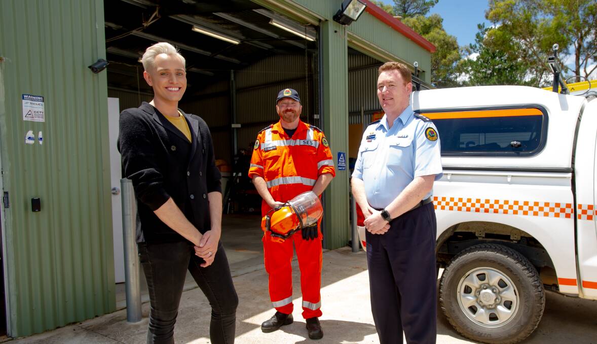 National Museum of Australia curator Craig Middleton (left) with NSW SES Sutton unit commander Anthorr Nomchong (centre) and SES south-eastern zone commander Colin Malone. Picture: Elesa Kurtz