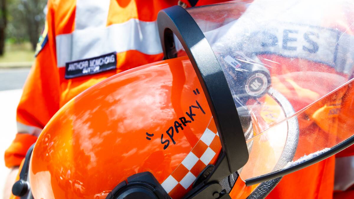 Anthorr Nomchong's nickname on his helmet tells of a very close call during his time volunteering with the SES. Picture: Elesa Kurtz 