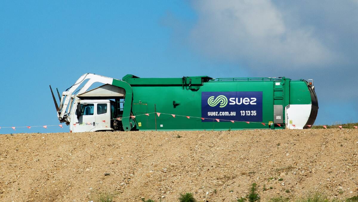 A Suez garbage truck at the Mugga Lane tip. Picture: Sitthixay Ditthavong