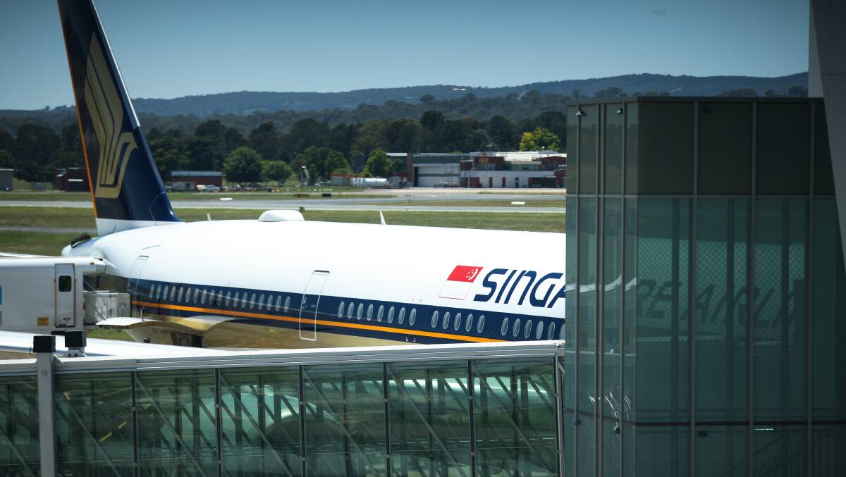 A repatriation flight arrived in Canberra from Singapore in late November. Picture: Sitthixay Ditthavong