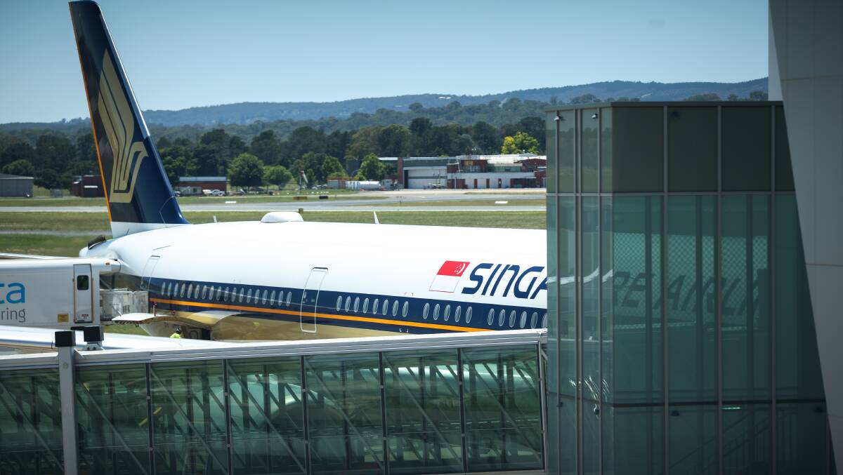A Singapore Airlines jet at Canberra airport after bringing Australians home from Singapore. Picture: Sitthixay Ditthavong