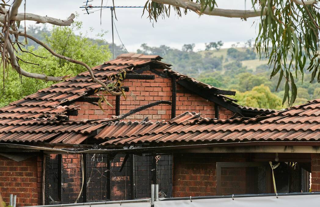 Remains of a house fire in Kambah that the Police are not treating as suspicious. Picture: Matt Loxton