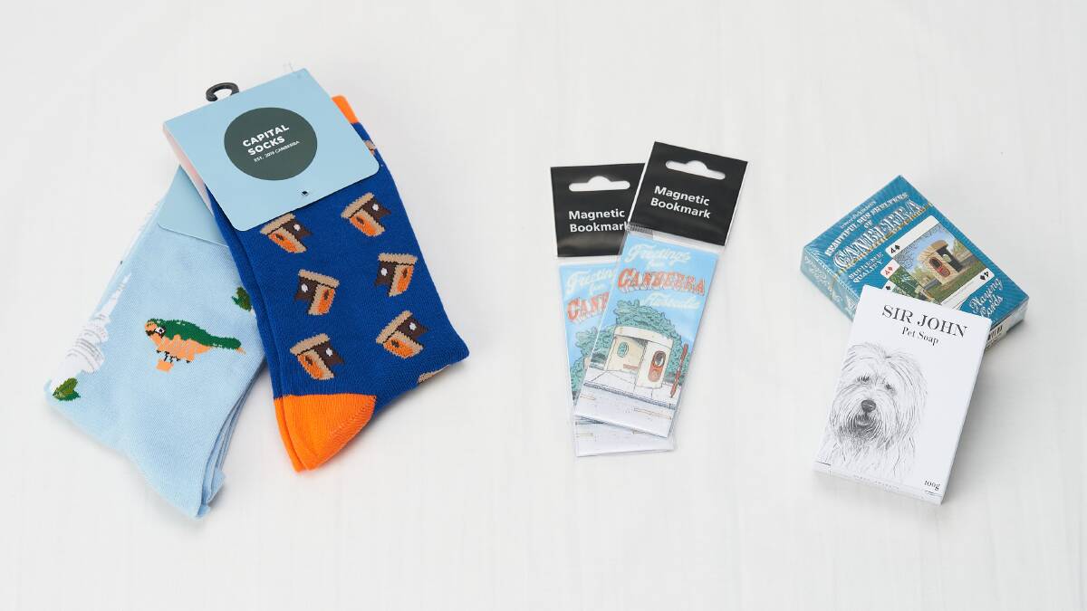 Capital Socks with Skywhale or Bus Stops ($20), POP Canberra; Beautiful Bus Stops bookmarks ($3.50) and playing cards ($20), and Sir John Pet Soap ($12), MOAD.