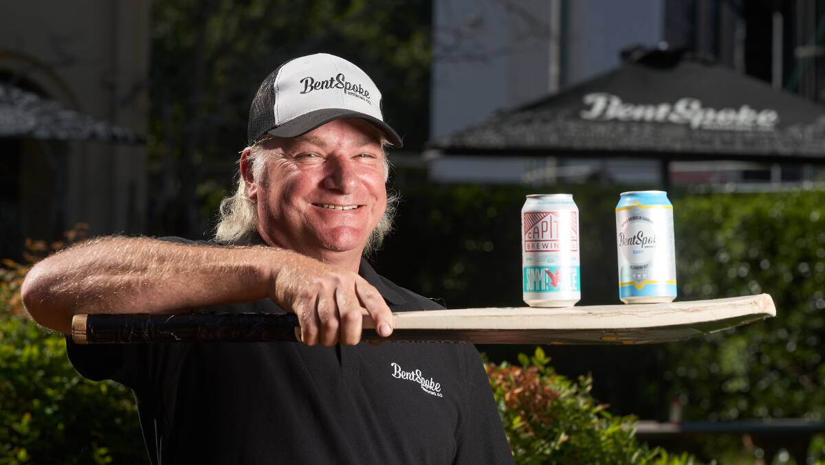 BentSpoke Co-owner Richard Watkins with Bentspoke and Capital Brewing Co beers, which will be available at Manuka Oval for the first time on Wednesday. Picture: Matt Loxton