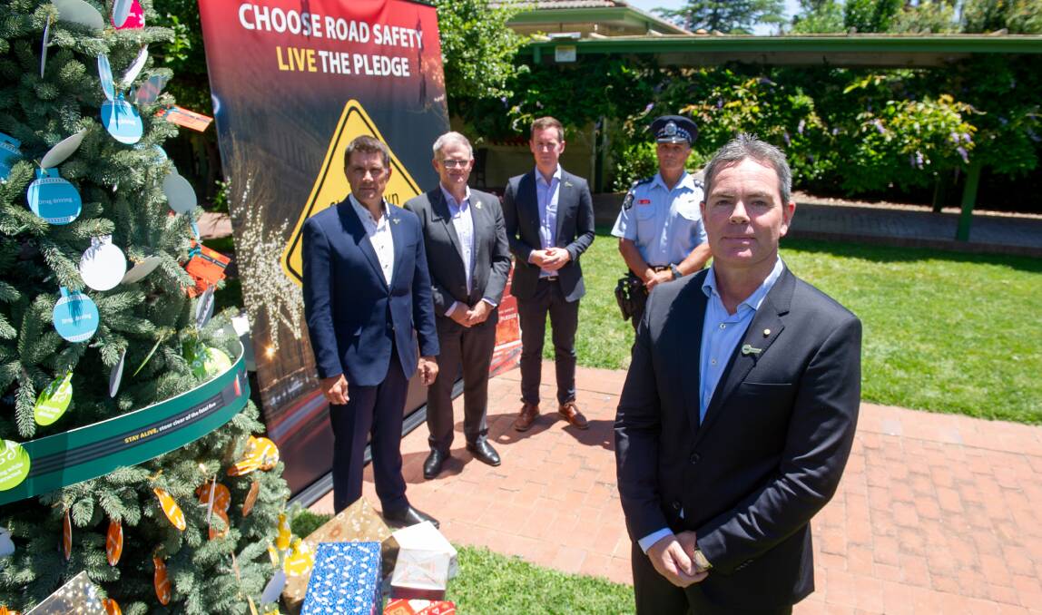 Australian Road Safety Foundation ambassador Craig Lowndes at the launch of a Christmas safety campaign with foundation chief executive Russell White, AAMI spokesman Dan Wilkinson, ACT Transport Minister Chris Steel and detective acting inspector Ivan Naspe. Picture: Elesa Kurtz 