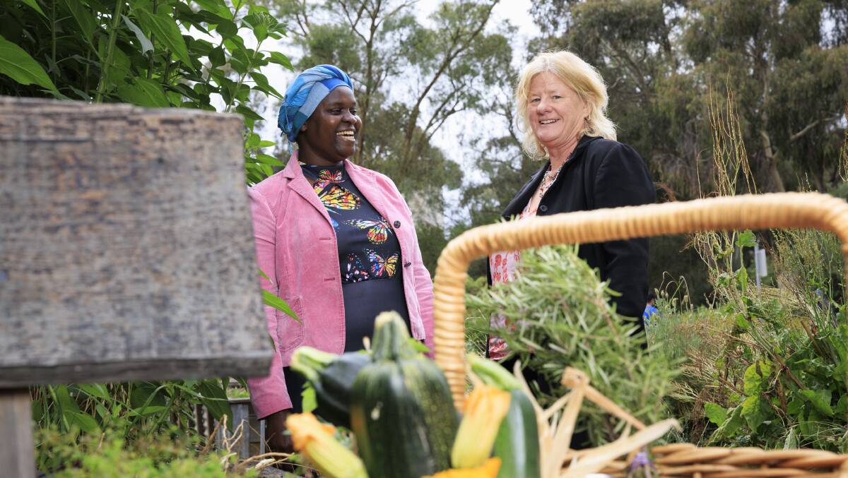 Florence Awino and Ro McFarlane are part of a research project which is hoping to determine how much food is being produced in the ACT. Picture by Keegan Carroll