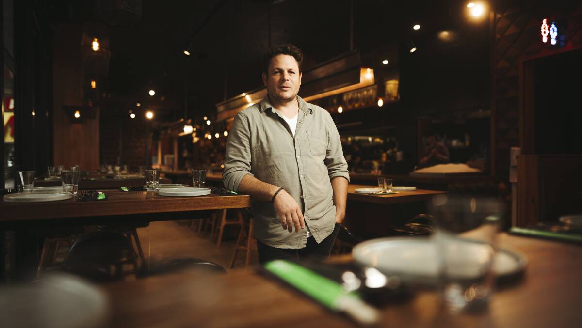 Chef James Viles recently moved to Canberra for a role at Akiba which has introduced menus accessible via smartphones. Picture: Dion Georgopoulos
