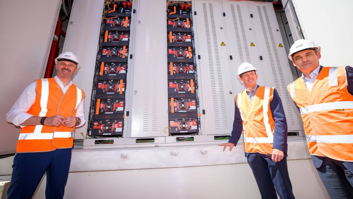 ACT Chief Minister Andrew Barr, Energy Minister Shane Rattenbury and Global Power Generation Chief Business Development Officer Pedro Serrano at the territory's first grid-scale battery. Picture by Sitthixay Ditthavong