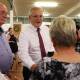Prime Minister Scott Morrison speaks to community members with Leichhardt MP Warren Entsch, during an afternoon tea at Railway Halls in Cairns on Monday. Picture: Getty Images
