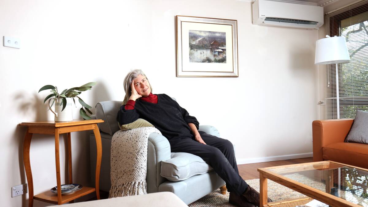 Megan Taylor has recently replaced her woodfire heater with an electric heater at her home in Narrabundah. Picture: James Croucher