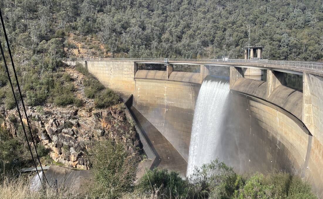While water flowed from a very full Bendora Dam last month, water security will be under the microscope as overall rainfall was expected to decrease over the next 50 years. Picture: Alex Crowe