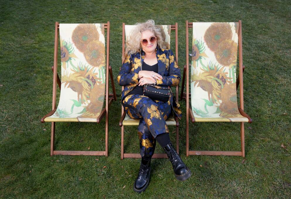 Tara Green relaxes on the lawns outside the National Gallery. Picture: Picture: Sitthixay Ditthavong