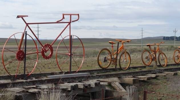 Orange bikes along the route show support for the ongoing project. Picture: Supplied.