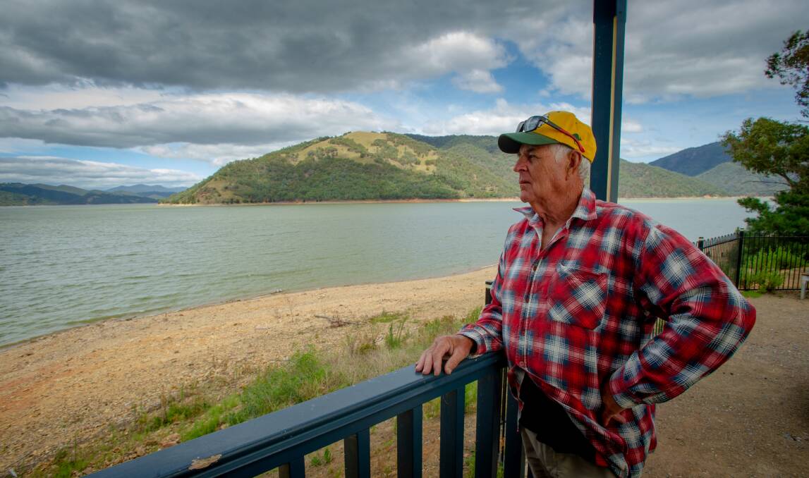 South Coast visitor Brian Dunham wasn't letting blue-green algae get in the way of his Lake Burrinjuck fishing plans. Authorities have issued a warning to avoid contact with the water. Picture: Elesa Kurtz