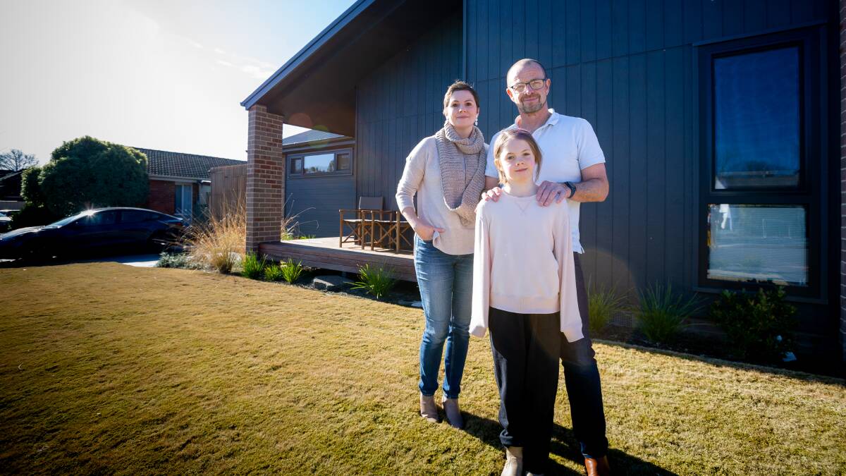 Lucy, Mia, 10 and Richard Ings have retrofitted their ex-government home to make it all electric and more energy efficient. Picture: Elesa Kurtz