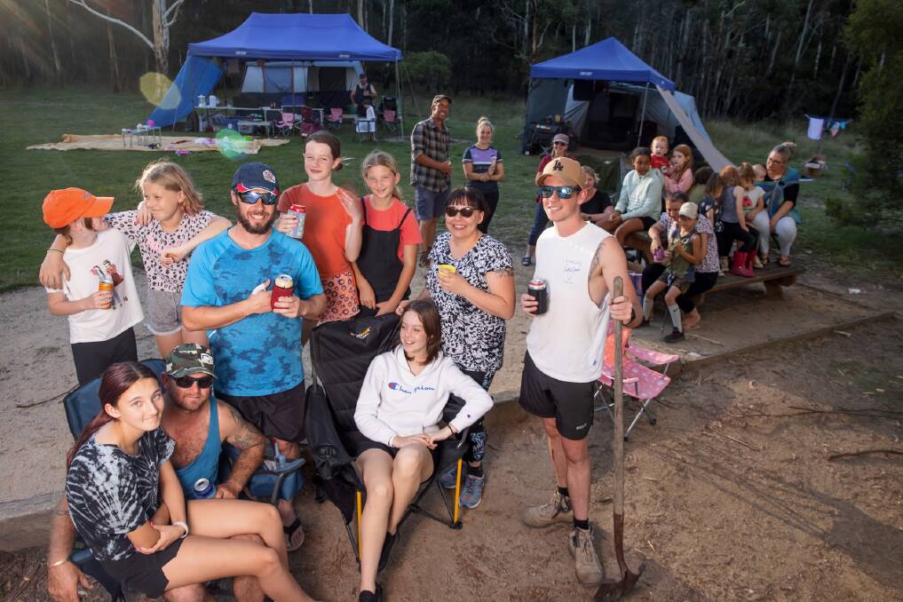 Lanyon Valley residents Aaron Taws, Matt Jones, Clare Incher and Aaron Fazey have been going away on regular joint camping trips with their families for the past three years. Picture: Sitthixay Ditthavong