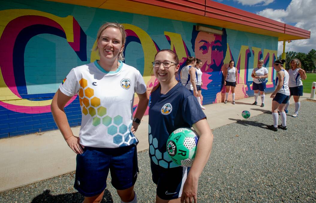 Founders of South Canberra Football Club Kat Yuile and Emma Steel with the women who have quit their clubs to be part of the recently-established all-female soccer club. Picture: Elesa Kurtz 
