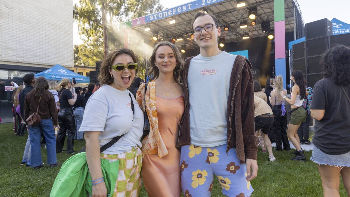 Sally McMillan, Jessica Heller and Roy Barnes enjoying the music at University of Canberra's Stonefest on Saturday. Picture by Keegan Carroll
