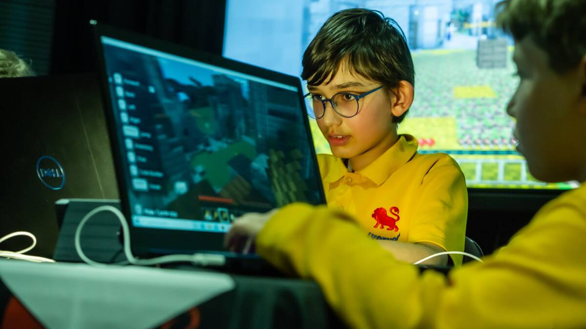 Lyneham Primary School student Hari Refshauge has a test run of Questacon's Cyber Castle Challenge. Picture by Karleen Minney