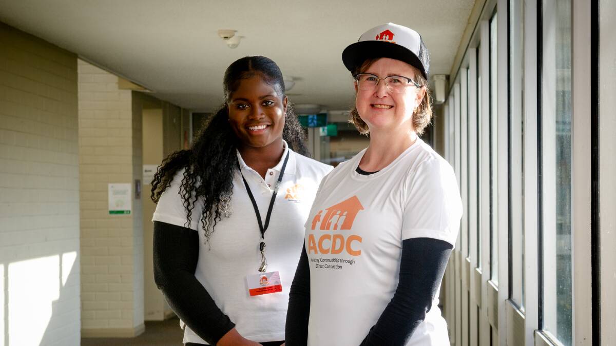 Door knocker Ester Abakah and ACDC program manager Karen McKernan will be talking with people in Canberra's north about their mental health. Picture: Elesa Kurtz 
