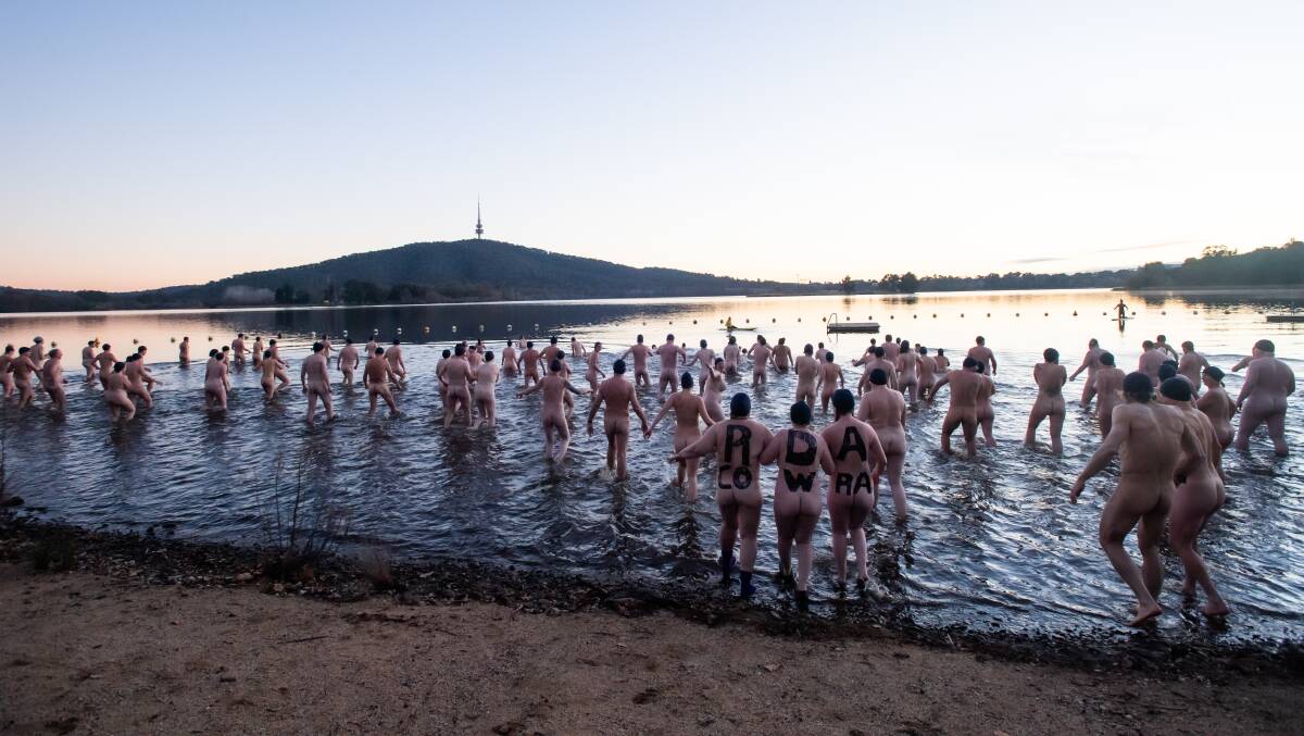 More than 250 people stripped off to swim in the chilly waters of Lake Burley Griffin on the shortest day of the year. Picture Karleen Minney