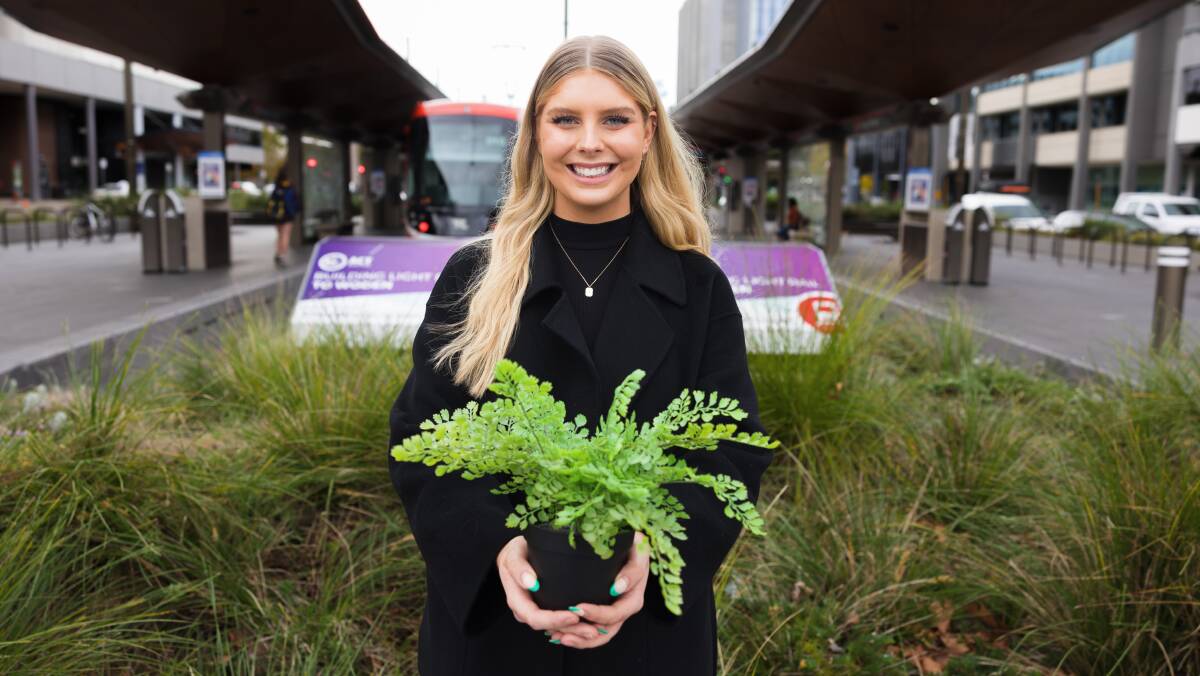 Australian National University graduate Kaitlin Hatherley has been awarded $5000 to help get her plan to green the tram lines off the ground. Picture: Sitthixay Ditthavong