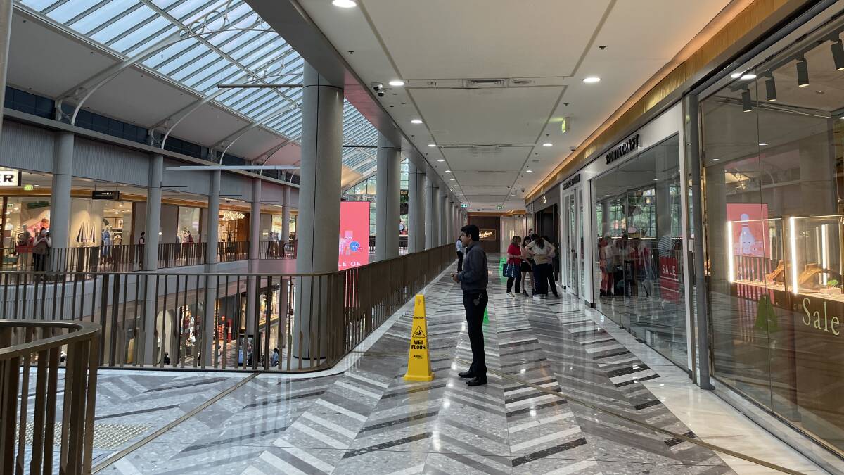 Several shops remained closed at the Canberra Centre at midday on Thursday after water streamed through the ceiling during this week's heavy storm. Picture by Alex Crowe