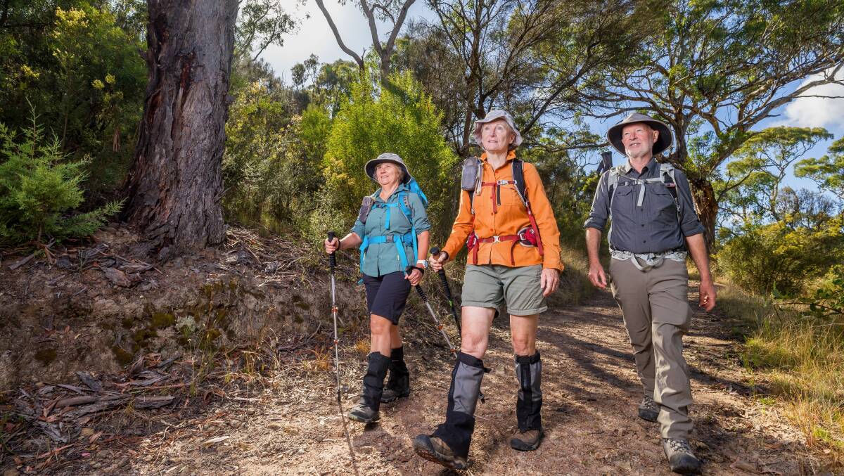 Canberra Bushwalking Club's Andrea Coomblas, Terrylea Reynolds and Andrew Meers. The club advocates for safe exploration of parks and reserves in the ACT and surrounding regions. Picture by Sitthixay Ditthavong