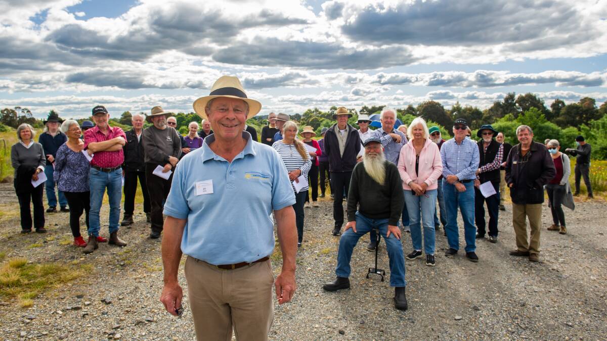 Goulburn Community Energy Cooperative vice president Ed Suttle leads investors on a site tour of where the solar farm will be built in Goulburn. Picture by Elesa Kurtz