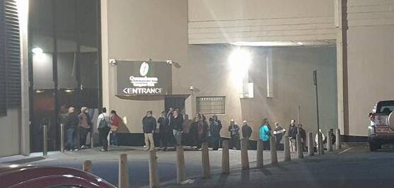 Patrons queue at Queanbeyan Leagues Club during the period gaming machines remained banned in Canberra. Picture: Supplied