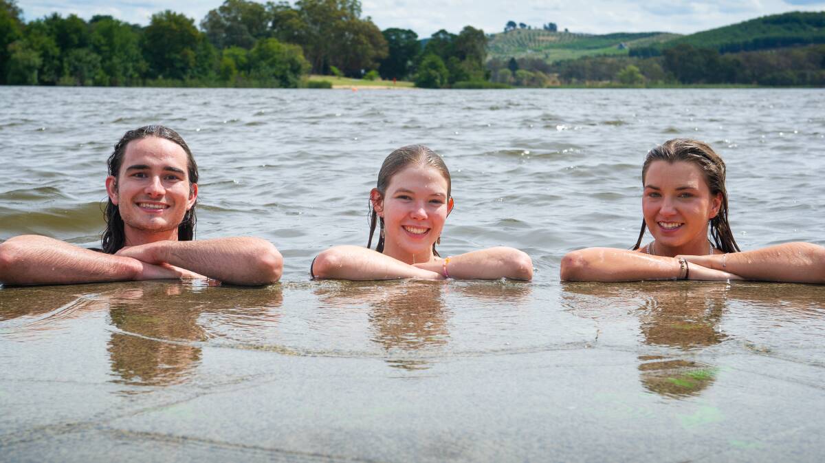 Rohan Hale, Bridget Hovan and Dorothy Daley enjoy a swim on the last day of summer before the cooler weather sets in. Picture by Elesa Kurtz