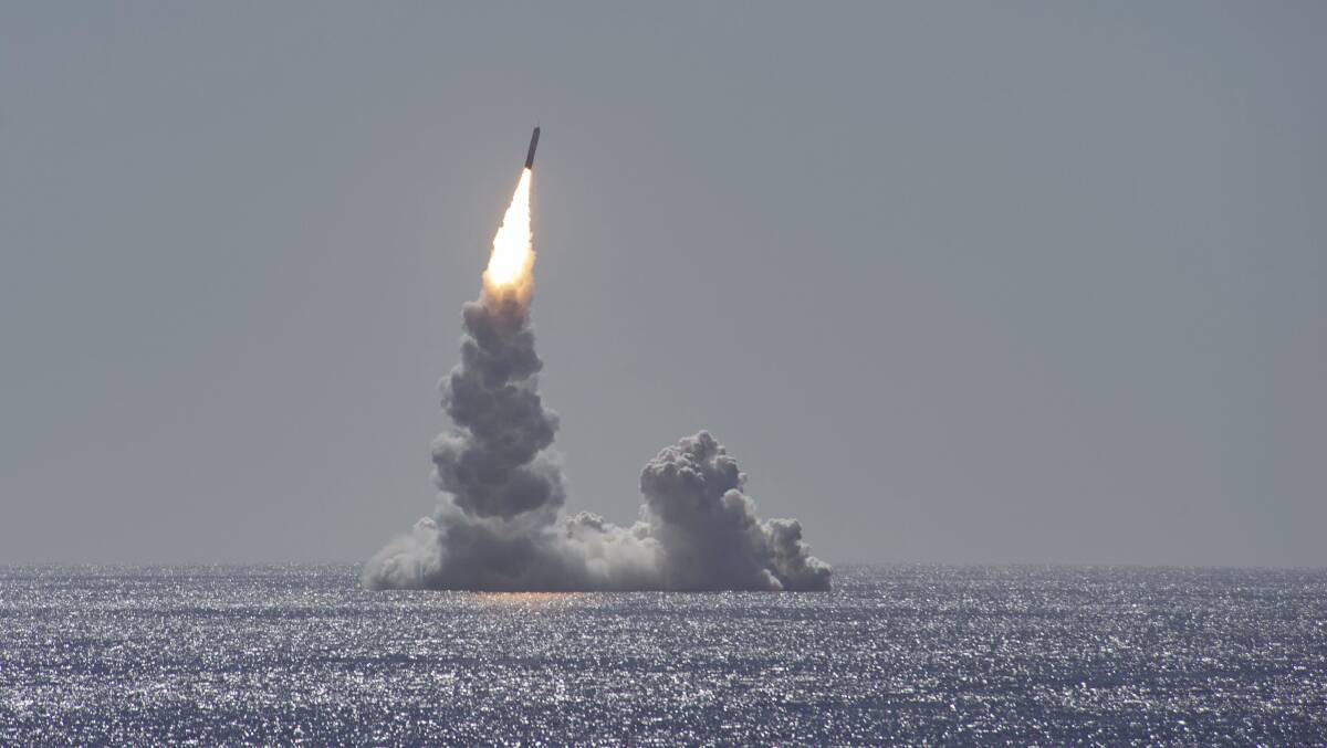 A missile launches from the USS Maine, one of the US's newer nuclear submarines. Picture: US Department of Defence